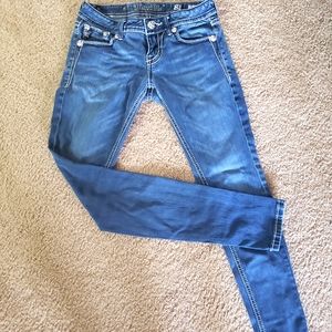MISS ME skinny jeans.  Rhinestone fleur-de-lis